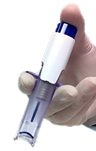 EYEPRIM™ device held between the fingers